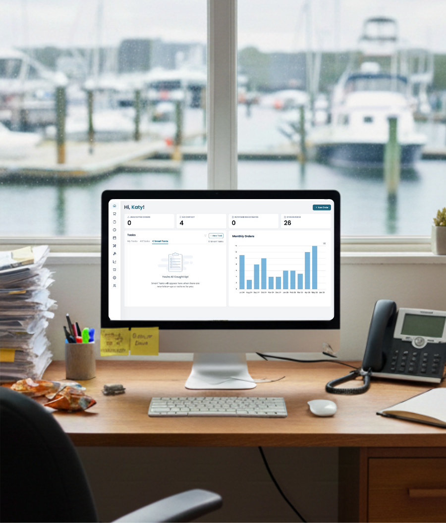Clean organized desk with Boatyard software showing streamlined operations